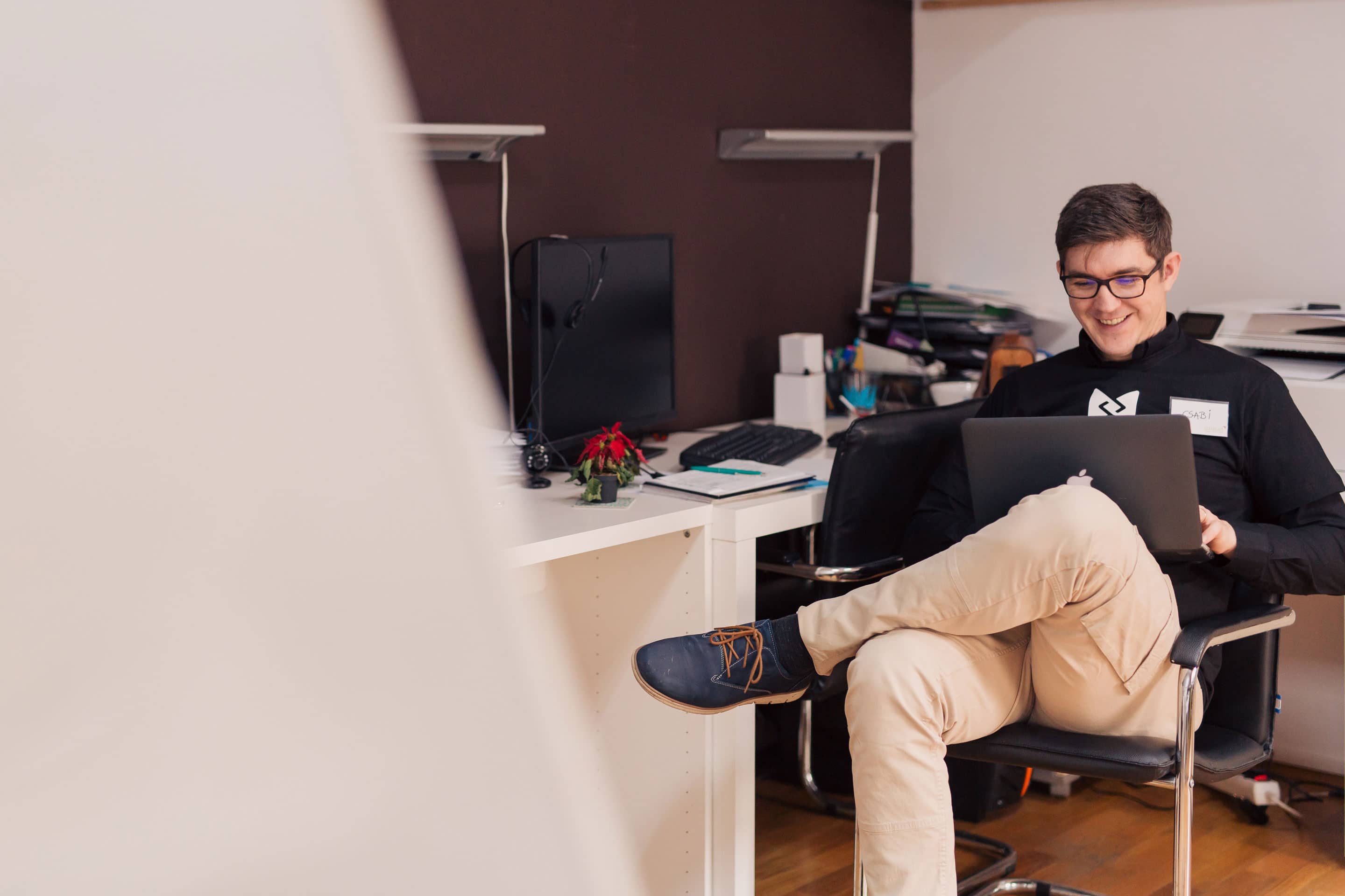 How to Attract High Paying Web Design Clients||Happy Man Sitting at Laptop