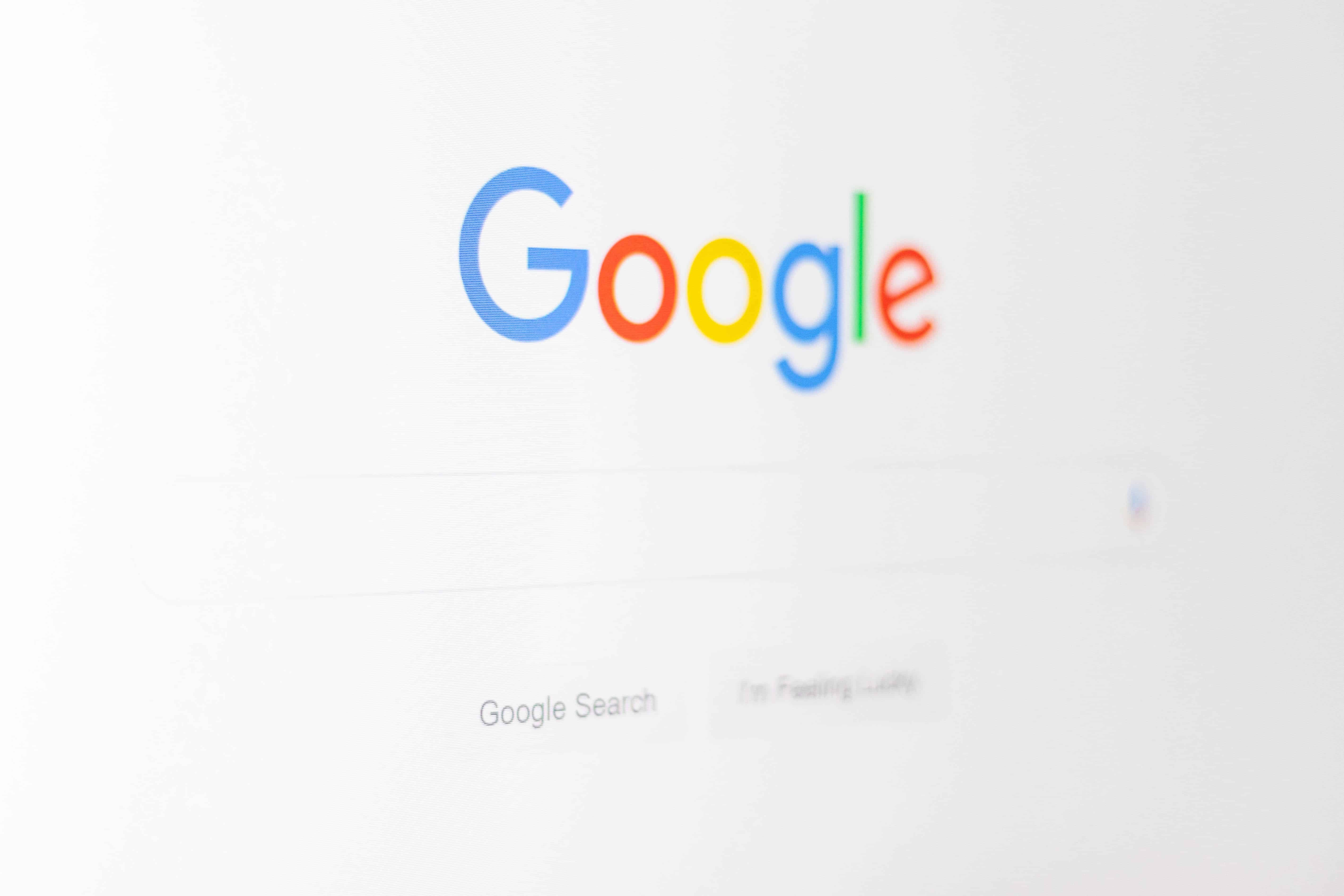 How to Grow a Strong Web Design Business with SEO || An image of the google search page on a computer