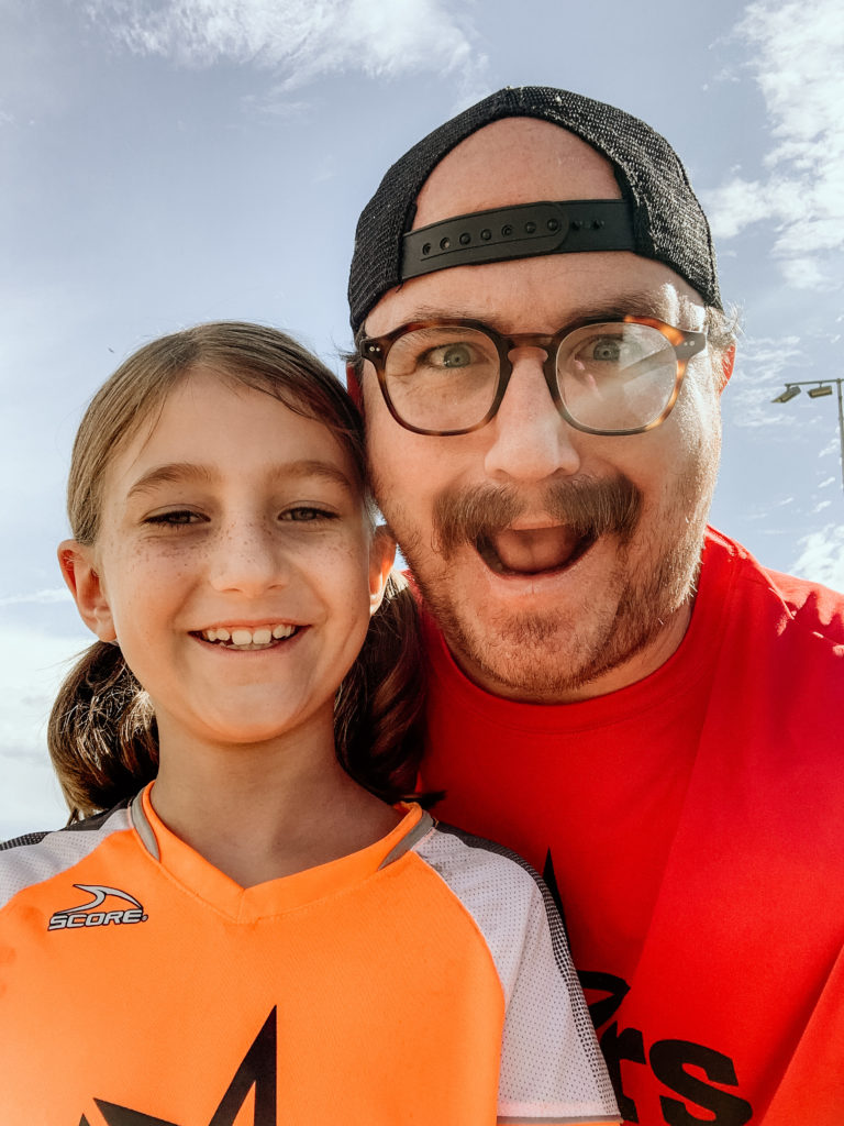 Me and my daughter at a soccer game to illustrate the mistakes freelancers make on Upwork
