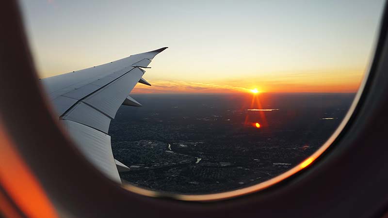 A plane window view to symbolize how to become a digital nomad